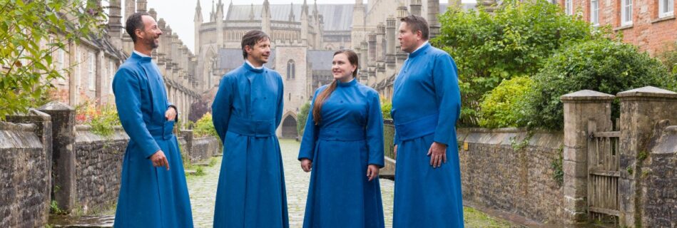 Image of Vicars Choral standing in Vicars' Close, Wells
